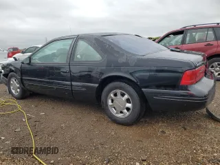 1997 Ford Thunderbird LX z VIN 1FALP62W0VH157636, wystawiony jako Copart lot #57436535 z przebiegiem 120 433 mil mil oraz Szkoda całkowita • Salvage title. Historia ofert i sprzedaży dostępna na DreamBid. Obrazek 2.