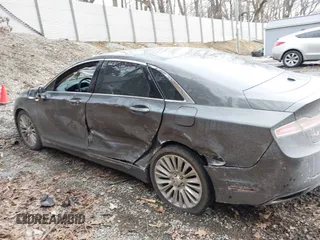 2015 Lincoln MKZ with VIN 3LN6L2J97FR616714, listed as a IAAI auction lot 41664184 with 116,495 mi miles and . Bid and sale history available at DreamBid. Image 14.