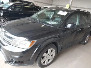 2012 Dodge Journey Crew with VIN 3C4PDCDG7CT183027, listed as a IAAI auction lot 41966923 with 153,576 mi miles and . Bid and sale history available at DreamBid. Image 2.