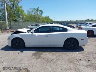 2013 Dodge Charger SE with VIN 2C3CDXBG9DH705485, listed as a IAAI auction lot 41788288 with 134,751 mi miles. Bid and sale history available at carsss.com. Image 15.