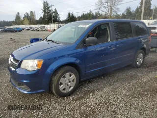 2011 Dodge Grand Caravan SXT with VIN 2D4RN4DG7BR779271, listed as a Copart auction lot 52609765 with 157,107 mi miles and Clean Title. Bid and sale history available at DreamBid. Image 1.