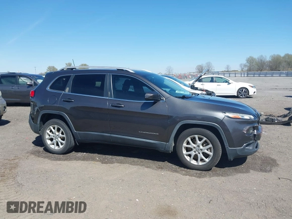 2017 Jeep Cherokee Latitude with VIN 1C4PJLCBXHW572714, listed as a IAAI auction lot 41861087 with 120,552 mi miles and . Bid and sale history available at DreamBid. Image 13.
