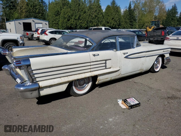 1958 Oldsmobile 88 z VIN 587M54933, wystawiony jako Copart lot #53116955 z przebiegiem 71 510 mil mil oraz Czysty tytuł • Clean title. Historia ofert i sprzedaży dostępna na DreamBid. Obrazek 3.