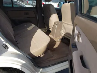 1998 Toyota 4Runner with VIN JT3GM84RXW0025303, listed as a IAAI auction lot 41693239 with 394,689 mi miles. Bid and sale history available at carsss.com. Image 8.