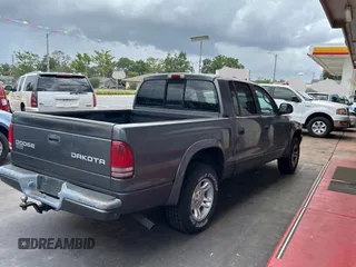 2003 Dodge Dakota Sport с VIN 1D7HL38N83S151291, выставлен на аукционе Copart как лот 60267175 с пробегом 162 785 миль миль и Чистый • Clean title. История ставок и продаж доступна на DreamBid. Изображение 4.
