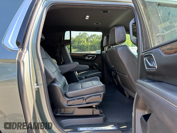 2023 Chevrolet Suburban Premier with VIN 1GNSCFKD0PR550962, listed as a Copart auction lot 63825105 with 24,722 mi miles and Salvage title. Bid and sale history available at DreamBid. Image 9.