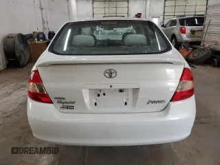 2003 Toyota Prius z VIN JT2BK18U530079842, wystawiony jako Copart lot #52776915 z przebiegiem 223 077 mil mil oraz Szkoda całkowita • Salvage title. Historia ofert i sprzedaży dostępna na DreamBid. Obrazek 6.