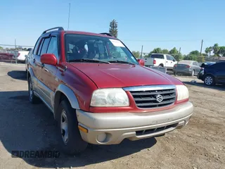 2002 Suzuki Grand Vitara JLX with VIN JS3TD62V524153953, listed as a IAAI auction lot 42619018 with 133,653 mi miles and . Bid and sale history available at DreamBid. Image 1.