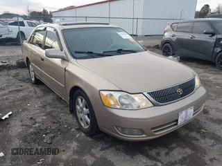 2001 Toyota Avalon XL w/Bucket Seats with VIN 4T1BF28BX1U141849, listed as a IAAI auction lot 41467945 with 188,675 mi miles. Bid and sale history available at carsss.com. Image 1.