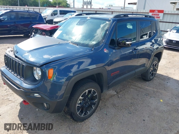 2023 Jeep Renegade Trailhawk with VIN ZACNJDC19PPP70231, listed as a IAAI auction lot 42236217 with 30,880 mi miles and . Bid and sale history available at DreamBid. Image 2.
