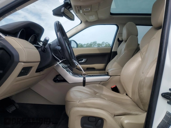 2015 Land Rover Range Rover Evoque Pure Premium с VIN SALVR2BG3FH992977, выставлен на аукционе Copart как лот 46946575 с пробегом 123 835 миль миль и Чистый • Clean title. История ставок и продаж доступна на DreamBid. Изображение 7.