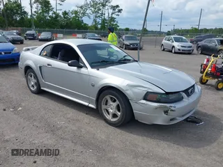 2004 Ford Mustang Standard z VIN 1FAFP40494F117830, wystawiony jako IAAI lot #42212706 z przebiegiem 160 172 mil mil oraz . Historia ofert i sprzedaży dostępna na DreamBid. Obrazek 1.