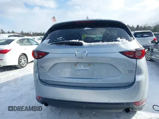2021 Mazda CX-5 Grand Touring Reserve with VIN JM3KFBAY0M0377030, listed as a IAAI auction lot 41606709 with 39,590 mi miles. Bid and sale history available at carsss.com. Image 16.