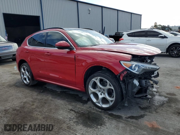 2023 Alfa Romeo Stelvio Ti z VIN ZASPAKBN2P7D65711, wystawiony jako Copart lot #55311535 z przebiegiem 32 906 mil mil oraz Nie do naprawy. Historia ofert i sprzedaży dostępna na DreamBid. Obrazek 4.