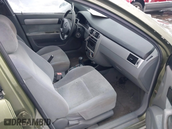 2004 Suzuki Forenza S z VIN KL5JD52Z64K027219, wystawiony jako IAAI lot #41799510 z przebiegiem Nie podano mil oraz . Historia ofert i sprzedaży dostępna na DreamBid. Obrazek 5.