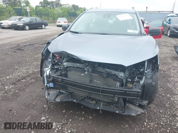 2022 Toyota Corolla Cross L with VIN 7MUAAABG0NV024424, listed as a IAAI auction lot 42261227 with 20,171 mi miles and . Bid and sale history available at DreamBid. Image 6.