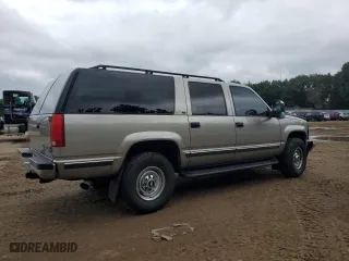 1999 Chevrolet Suburban with VIN 1GNGK26J0XJ439859, listed as a Copart auction lot 69076004 with 277,201 mi miles and Salvage Title. Bid and sale history available at carsss.com. Image 3.