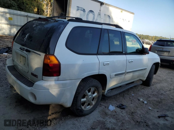 2002 GMC Envoy SLT with VIN 1GKDS13S822460095, listed as a Copart auction lot 77004764 with 267,716 mi miles and Salvage Title. Bid and sale history available at carsss.com. Image 3.