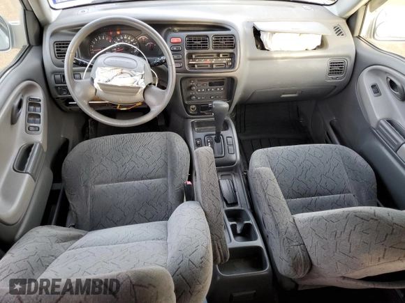 2004 Chevrolet Tracker LT z VIN 2CNBE634X46900683, wystawiony jako Copart lot #88601815 z przebiegiem 146 915 mil mil oraz Szkoda całkowita • Salvage title. Historia ofert i sprzedaży dostępna na DreamBid. Obrazek 8.