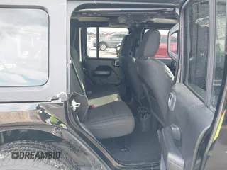 2021 Jeep Wrangler Unlimited Sport S with VIN 1C4HJXDN0MW817146, listed as a IAAI auction lot 41459993 with 20,367 mi miles and . Bid and sale history available at DreamBid. Image 8.