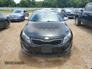 2013 Kia Optima SX z VIN 5XXGR4A65DG215196, wystawiony jako Copart lot #60927695 z przebiegiem 73 164 mil mil oraz Czysty tytuł • Clean title. Historia ofert i sprzedaży dostępna na DreamBid. Obrazek 6.