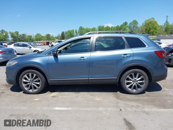 2015 Mazda CX-9 Grand Touring with VIN JM3TB3DV4F0448210, listed as a IAAI auction lot 42061711 with 149,289 mi miles. Bid and sale history available at carsss.com. Image 14.