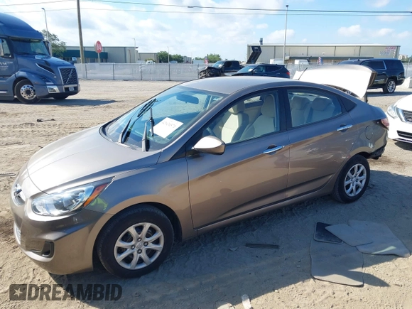 2012 Hyundai Accent GLS with VIN KMHCT4AE4CU097413, listed as a IAAI auction lot 42024571 with 120,672 mi miles. Bid and sale history available at carsss.com. Image 16.