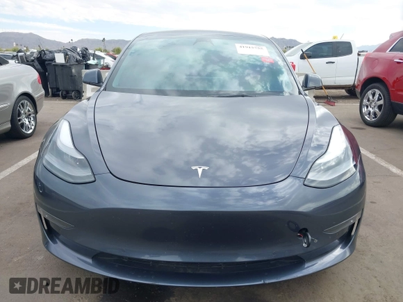 2022 Tesla Model 3 Long Range with VIN 5YJ3E1EB9NF164774, listed as a IAAI auction lot 41915755 with 39,625 mi miles and . Bid and sale history available at DreamBid. Image 12.