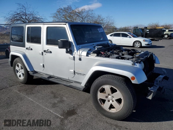 2007 Jeep Wrangler Unlimited Sahara with VIN 1J4GB59197L144781, listed as a Copart auction lot 48678315 with 137,538 mi miles and Salvage title. Bid and sale history available at DreamBid. Image 4.