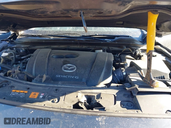 2022 Mazda 3 Carbon Edition z VIN 3MZBPACL4NM309701, wystawiony jako IAAI lot #41419875 z przebiegiem 23 819 mil mil oraz . Historia ofert i sprzedaży dostępna na DreamBid. Obrazek 10.