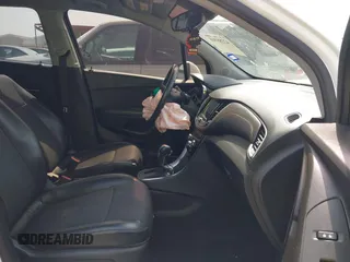 2020 Chevrolet Trax LT with VIN KL7CJLSB2LB009170, listed as a IAAI auction lot 42285508 with 40,936 mi miles and . Bid and sale history available at DreamBid. Image 5.