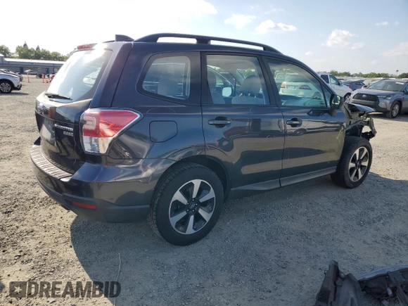 2017 Subaru Forester with VIN JF2SJABC4HH485602, listed as a Copart auction lot 53646155 with 156,935 mi miles and Salvage title. Bid and sale history available at DreamBid. Image 3.