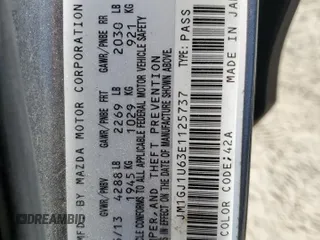 2014 Mazda 6 i Sport with VIN JM1GJ1U63E1125737, listed as a Copart auction lot 48692865 with 106,518 mi miles and Salvage Title. Bid and sale history available at DreamBid. Image 14.