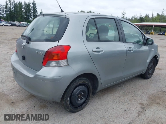 2010 Toyota Yaris z VIN JTDKT4K36A5290179, wystawiony jako IAAI lot #42515432 z przebiegiem 101 224 mil mil oraz . Historia ofert i sprzedaży dostępna na DreamBid. Obrazek 4.
