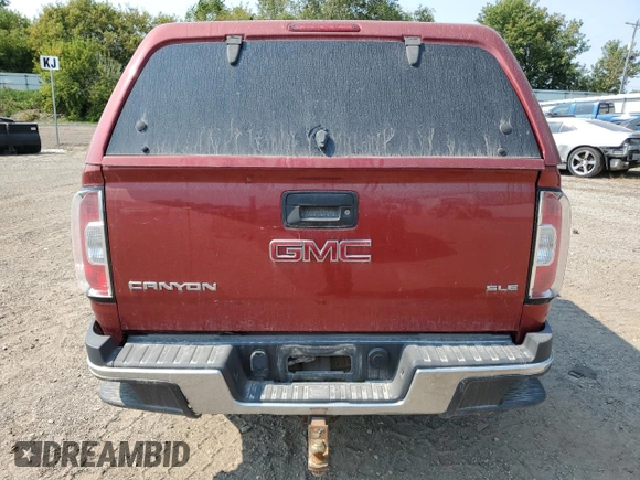 2016 GMC Canyon 4WD SLE with VIN 1GTH6CE35G1298295, listed as a Copart auction lot 71359754 with 68,624 mi miles and Clean Title. Bid and sale history available at carsss.com. Image 6.