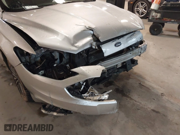 2017 Ford Fusion SE z VIN 3FA6P0H95HR203170, wystawiony jako IAAI lot #41569303 z przebiegiem 143 287 mil mil oraz . Historia ofert i sprzedaży dostępna na DreamBid. Obrazek 6.