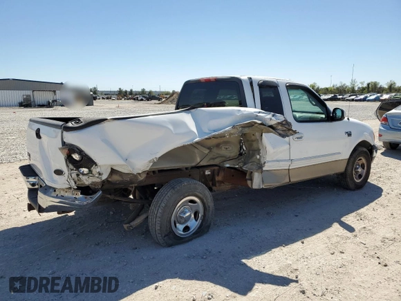 2002 Ford F-150 XL with VIN 1FTRX17W82NA64876, listed as a Copart auction lot 50013045 with 256,345 mi miles and Salvage Title. Bid and sale history available at carsss.com. Image 3.