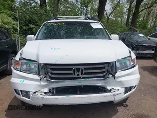 2012 Honda Ridgeline RTL with VIN 5FPYK1F57CB453096, listed as a IAAI auction lot 42206169 with 82,846 mi miles and . Bid and sale history available at DreamBid. Image 12.