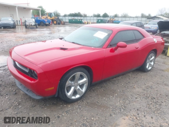 2013 Dodge Challenger R/T with VIN 2C3CDYBT5DH588006, listed as a IAAI auction lot 41858679 with 160,911 mi miles. Bid and sale history available at carsss.com. Image 2.