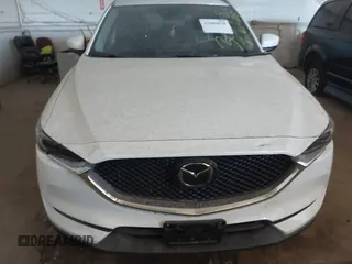 2019 Mazda CX-5 Grand Touring with VIN JM3KFBDM5K0520852, listed as a IAAI auction lot 42686818 with 36,800 mi miles and . Bid and sale history available at DreamBid. Image 12.