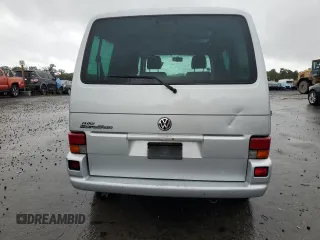 2003 Volkswagen EuroVan с VIN WV2KB47093H041606, выставлен на аукционе Copart как лот 73808224 с пробегом 228 496 миль миль и Чистый • Clean title. История ставок и продаж доступна на DreamBid. Изображение 6.