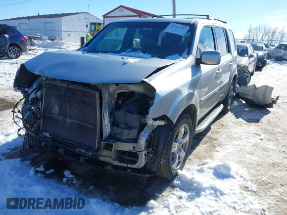 2014 Honda Pilot EX-L with VIN 5FNYF3H78EB006464, listed as a IAAI auction lot 41321137 with 198,496 mi miles and . Bid and sale history available at DreamBid. Image 18.