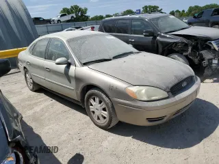 2007 Ford Taurus SEL with VIN 1FAFP56U97A177718, listed as a Copart auction lot 58003135 with 122,079 mi miles and Salvage title. Bid and sale history available at DreamBid. Image 4.