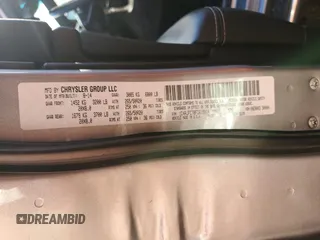 2015 Jeep Grand Cherokee Overland with VIN 1C4RJFCT8FC619014, listed as a Copart auction lot 44304375 with 123,767 mi miles and Salvage Title. Bid and sale history available at carsss.com. Image 14.