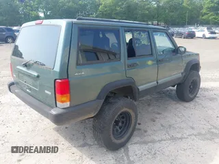 2000 Jeep Cherokee with VIN 1J4FF48S8YL242593, listed as a IAAI auction lot 42577724 with 127,138 mi miles and . Bid and sale history available at DreamBid. Image 4.