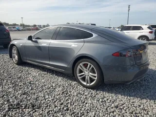 2014 Tesla Model S 60 with VIN 5YJSA1H1XEFP32590, listed as a Copart auction lot 64424145 with Not provided miles and Clean title. Bid and sale history available at DreamBid. Image 2.