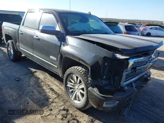 2014 Chevrolet Silverado 1500 High Country with VIN 3GCUKTEC1EG437170, listed as a IAAI auction lot 41742882 with 101,779 mi miles. Bid and sale history available at carsss.com. Image 1.