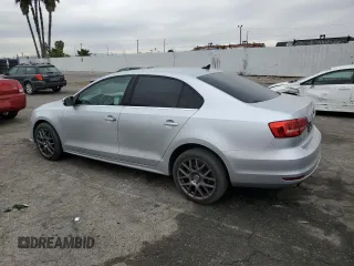 2015 Volkswagen Jetta SE with VIN 3VWD17AJ5FM260475, listed as a Copart auction lot 84764864 with 119,189 mi miles and Salvage title. Bid and sale history available at DreamBid. Image 2.