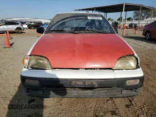 1994 Suzuki Swift z VIN JS2AC35SXR5101107, wystawiony jako Copart lot #75097084 z przebiegiem 78 924 mil mil oraz Szkody całkowita. Historia ofert i sprzedaży dostępna na DreamBid. Obrazek 5.