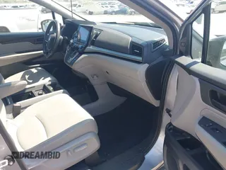 2018 Honda Odyssey Touring with VIN 5FNRL6H84JB070387, listed as a IAAI auction lot 41835852 with 98,662 mi miles. Bid and sale history available at carsss.com. Image 5.